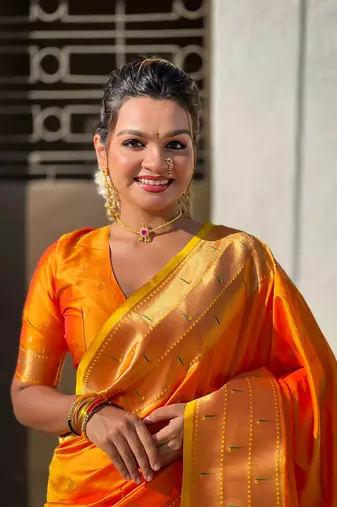 Orange zari woven gudi padwa special paithani silk blend saree