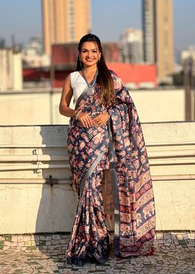 Dark blue tussar silk blend printed saree with zari woven border 1