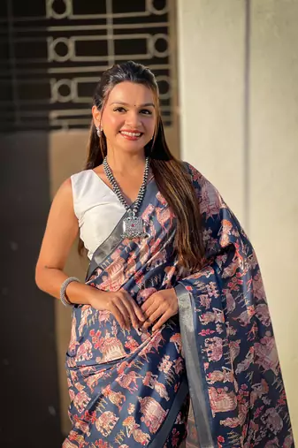 Dark blue tussar silk blend printed saree with zari woven border