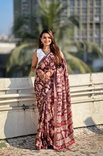 Dark brown tussar silk blend printed saree with zari woven border