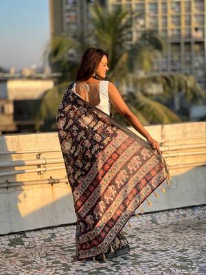 Black tussar silk blend printed saree with zari woven border 3