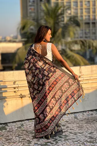 Black tussar silk blend printed saree with zari woven border