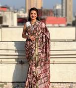 Bottle green tussar silk blend printed saree with zari woven border