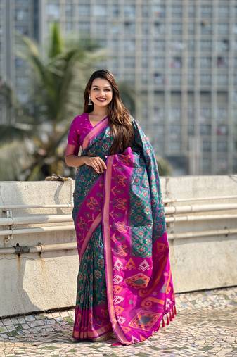 Green soft silk blend zari woven patola saree with contrast weaves