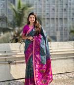 Green soft silk blend zari woven patola saree with contrast weaves