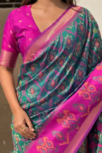 Green soft silk blend zari woven patola saree with contrast weaves
