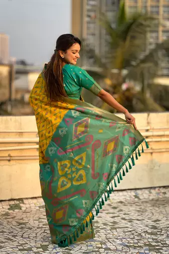 Yellow soft silk blend zari woven patola saree with contrast weaves
