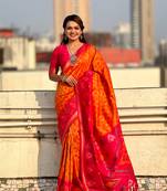 Orange soft silk blend zari woven patola saree with contrast weaves