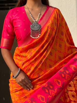 Orange soft silk blend zari woven patola saree with contrast weaves 4