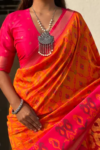 Orange soft silk blend zari woven patola saree with contrast weaves