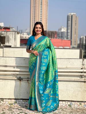 Pista green soft silk blend zari woven patola saree with contrast weaves 1