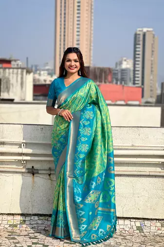 Pista green soft silk blend zari woven patola saree with contrast weaves