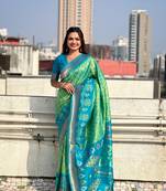 Pista green soft silk blend zari woven patola saree with contrast weaves