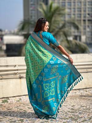 Pista green soft silk blend zari woven patola saree with contrast weaves 2