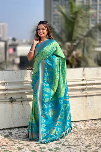 Pista green soft silk blend zari woven patola saree with contrast weaves