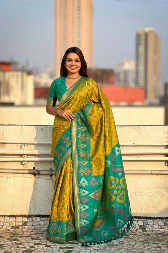 Mehendi green soft silk blend zari woven patola saree with contrast weaves