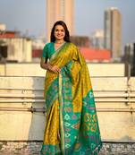 Mehendi green soft silk blend zari woven patola saree with contrast weaves