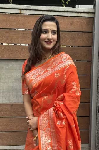 Orange banarasi jaal soft silk blend zari woven saree