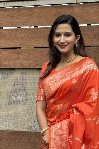 Orange banarasi jaal soft silk blend zari woven saree
