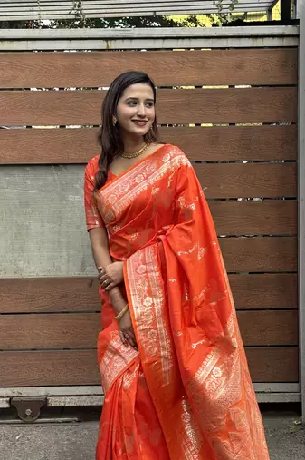 Orange banarasi jaal soft silk blend zari woven saree