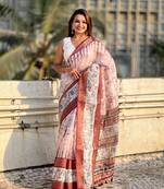 Pink chanderi crush silk blend floral printed saree with zari woven jacquard panel border