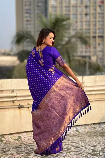 Violet soft silk blend dual zari woven saree with deer border