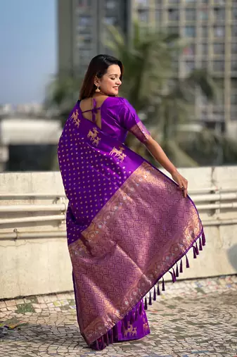 Purple soft silk blend dual zari woven saree with deer border