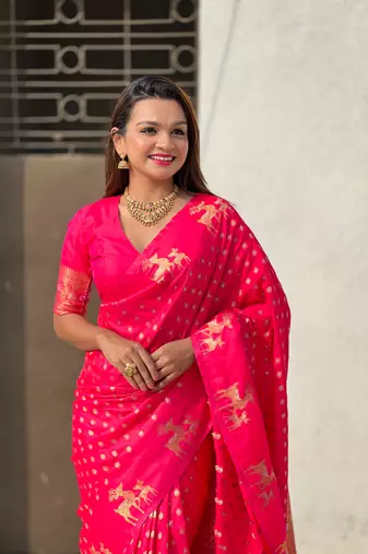 Pink soft silk blend dual zari woven saree with deer border
