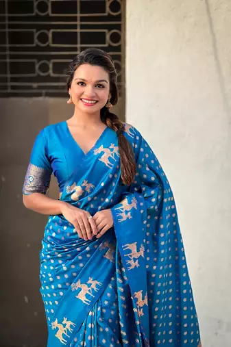Blue soft silk blend dual zari woven saree with deer border