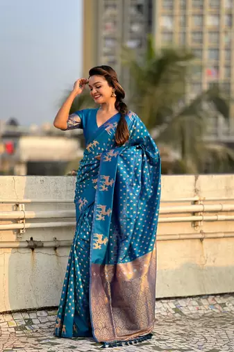 Blue soft silk blend dual zari woven saree with deer border