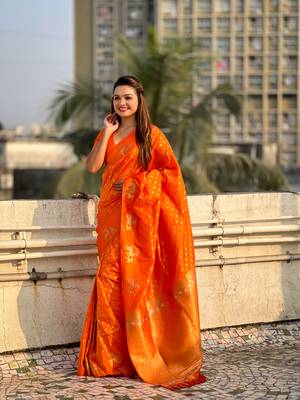 Orange soft silk blend dual zari woven saree with deer border 4