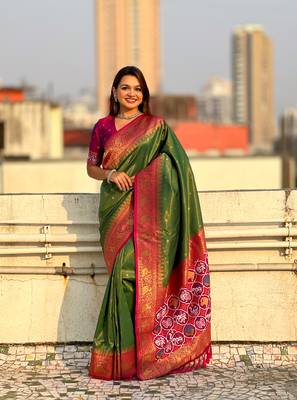 Mehendi green pure tissue zari woven patola saree with contrast weaves 1