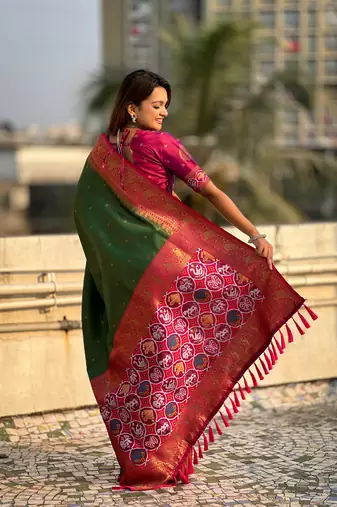 Mehendi green pure tissue zari woven patola saree with contrast weaves