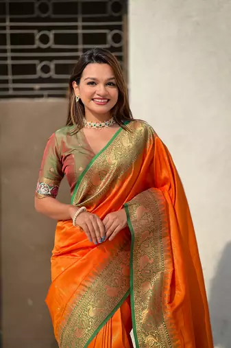 Orange pure tissue zari woven patola saree with contrast weaves
