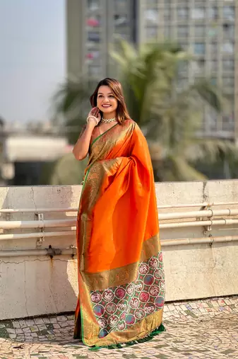 Orange pure tissue zari woven patola saree with contrast weaves