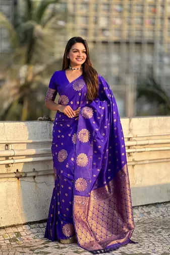 Violet soft silk blend dual zari woven saree with peacock border