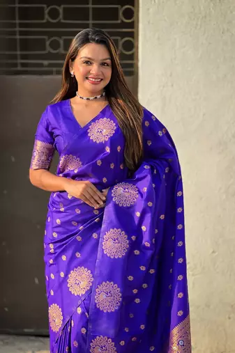 Violet soft silk blend dual zari woven saree with peacock border