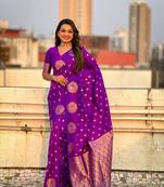 Purple soft silk blend dual zari woven saree with peacock border