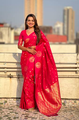 Pink soft silk blend dual zari woven saree with peacock border