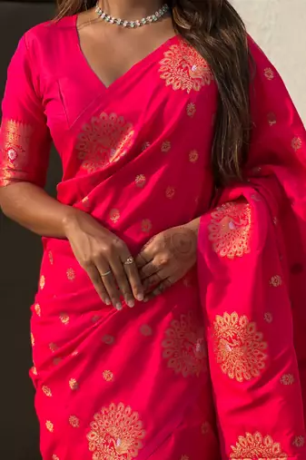 Pink soft silk blend dual zari woven saree with peacock border