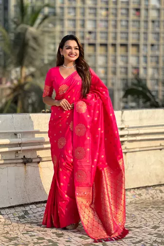 Pink soft silk blend dual zari woven saree with peacock border