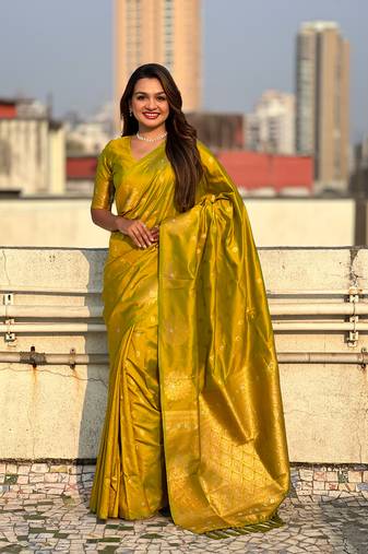 Mehendi green soft silk blend dual zari woven saree with peacock border