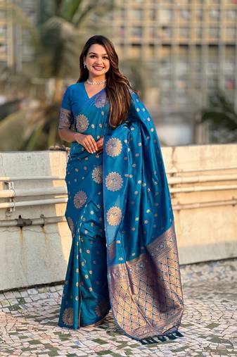 Blue soft silk blend dual zari woven saree with peacock border