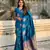 Blue soft silk blend dual zari woven saree with peacock border