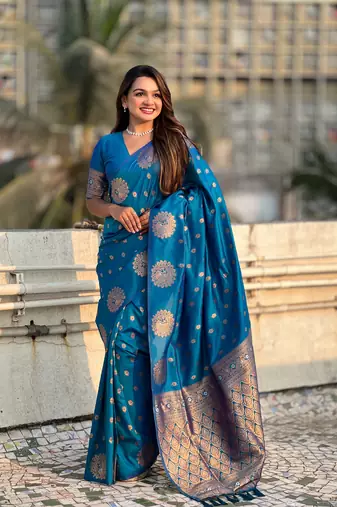 Blue soft silk blend dual zari woven saree with peacock border