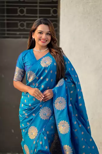 Blue soft silk blend dual zari woven saree with peacock border