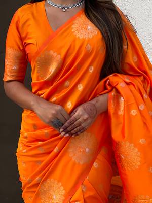 Orange soft silk blend dual zari woven saree with peacock border 3