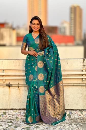 Green soft silk blend dual zari woven saree with peacock border