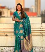 Green soft silk blend dual zari woven saree with peacock border