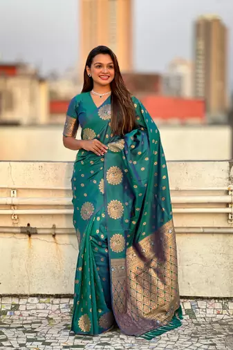 Green soft silk blend dual zari woven saree with peacock border